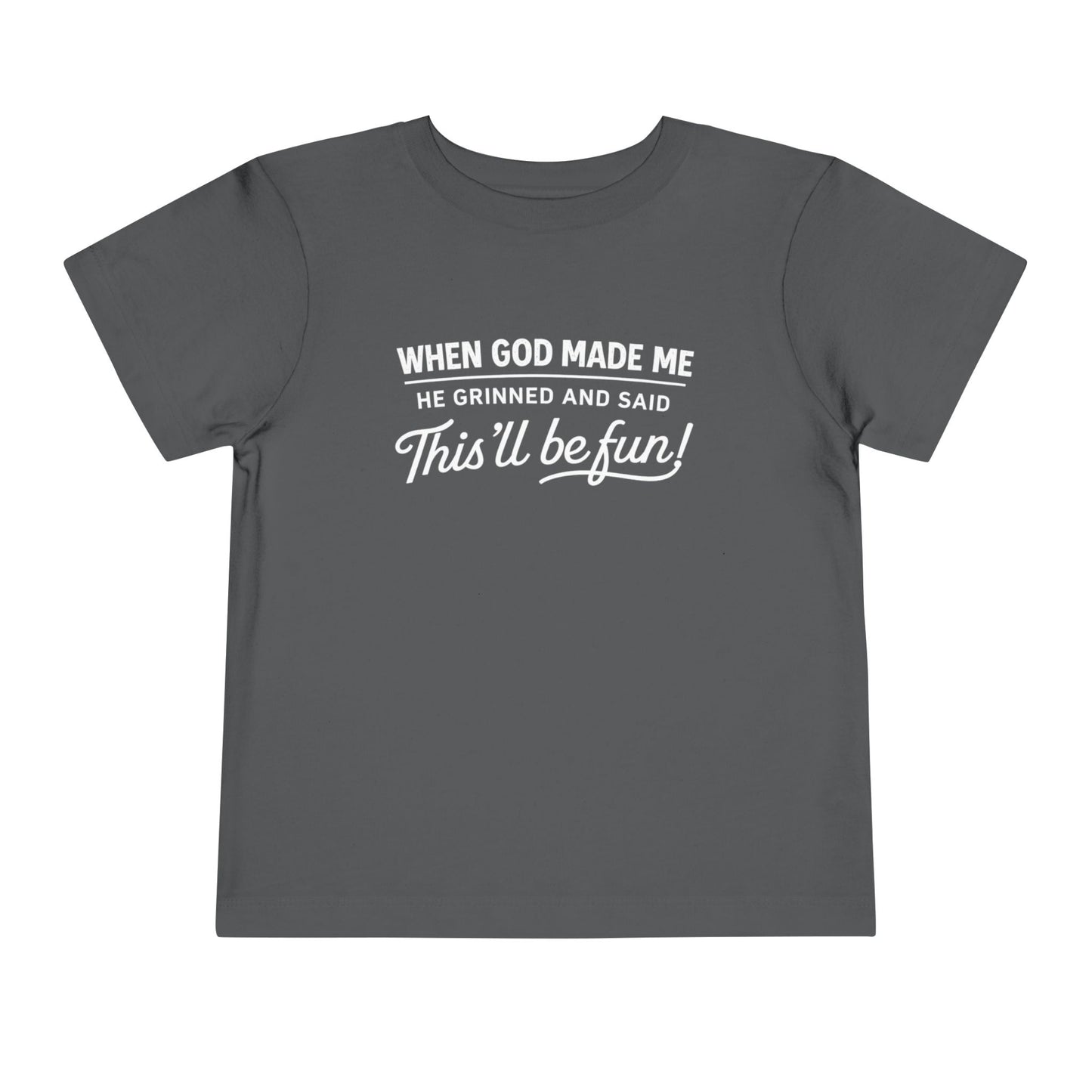 “When God made me he grinned and said , this’ll be fun” Toddler Tee