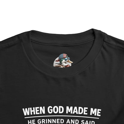 “When God made me he grinned and said , this’ll be fun” Toddler Tee