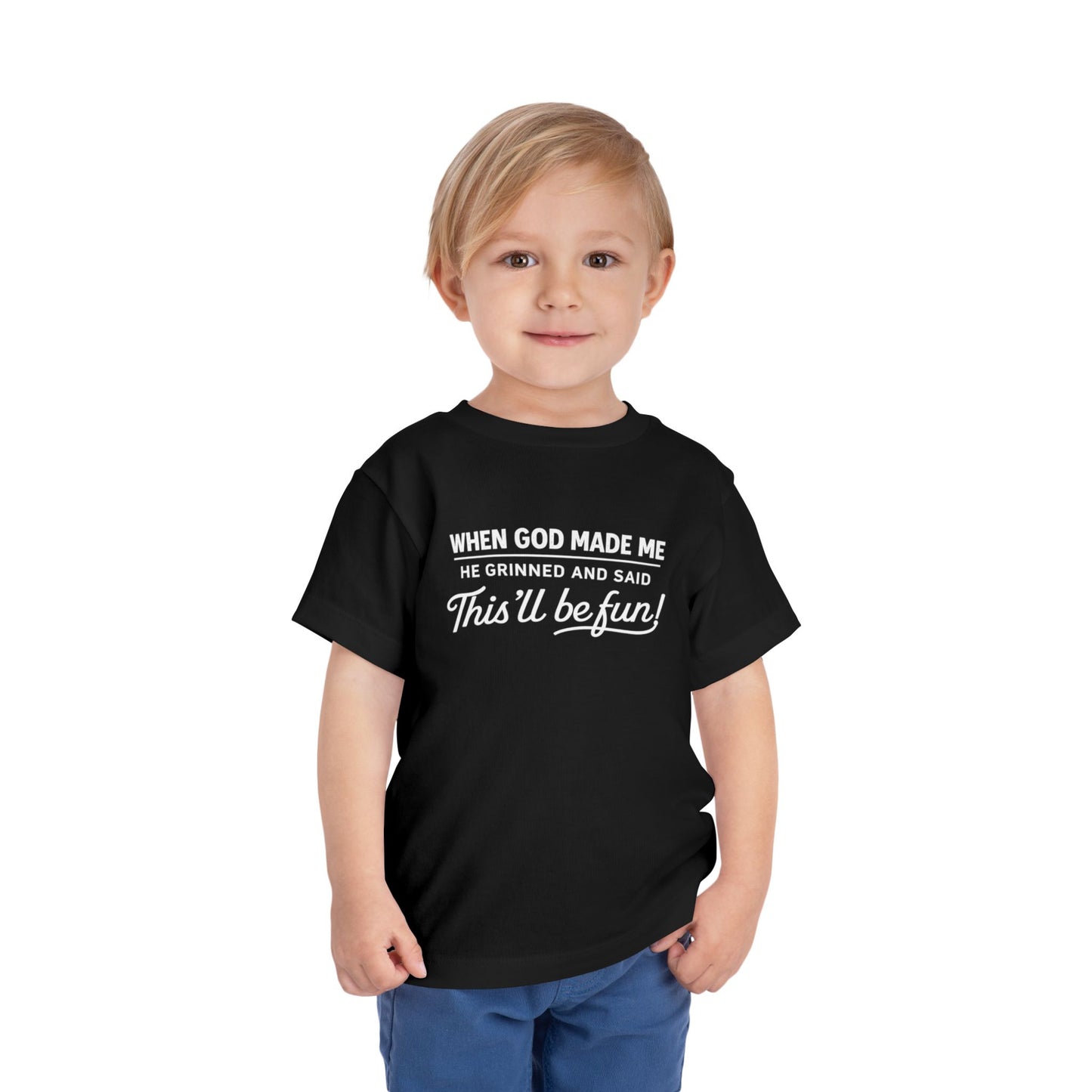 “When God made me he grinned and said , this’ll be fun” Toddler Tee