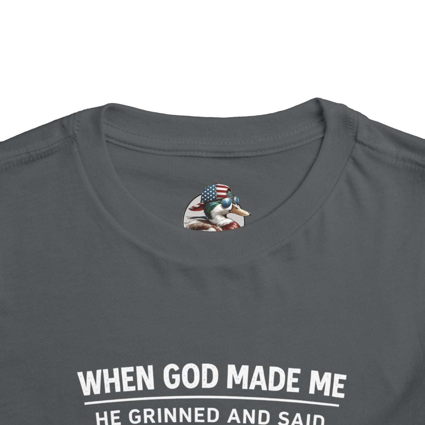 “When God made me he grinned and said , this’ll be fun” Toddler Tee