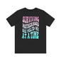 Surviving Motherhood Graphic Tee